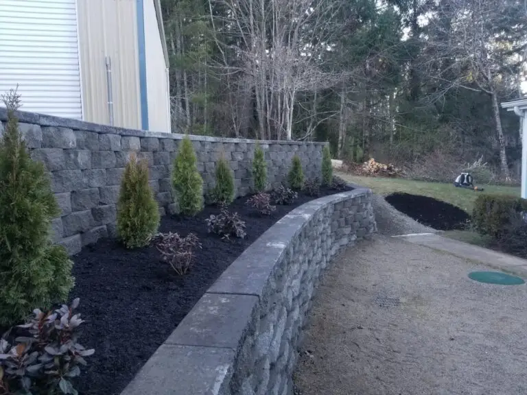 Landscaped garden with stone wall