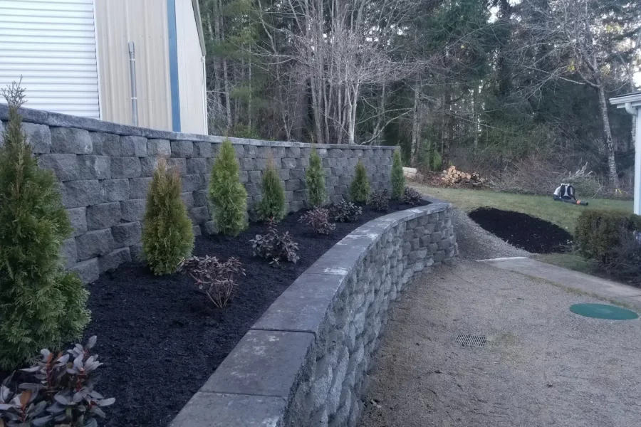 Landscaped garden with stone wall